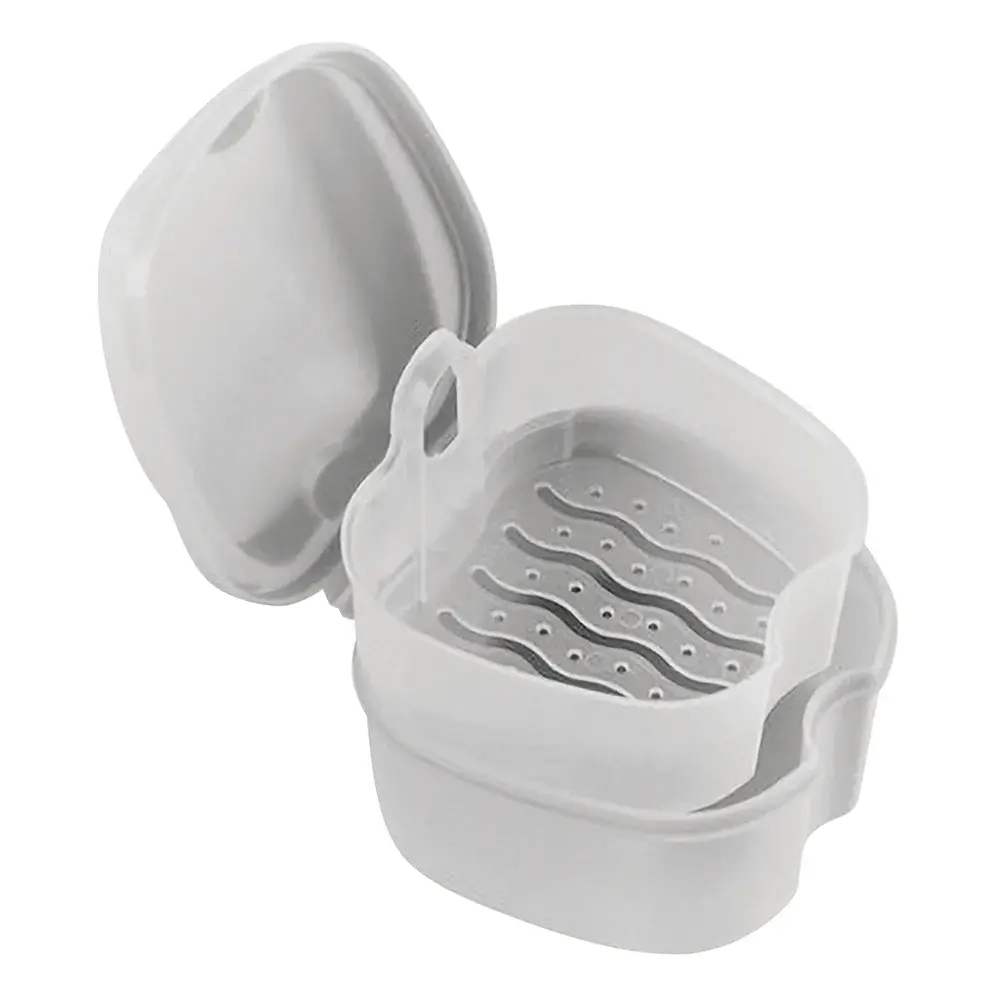 Boîte à dentier avec égouttoir