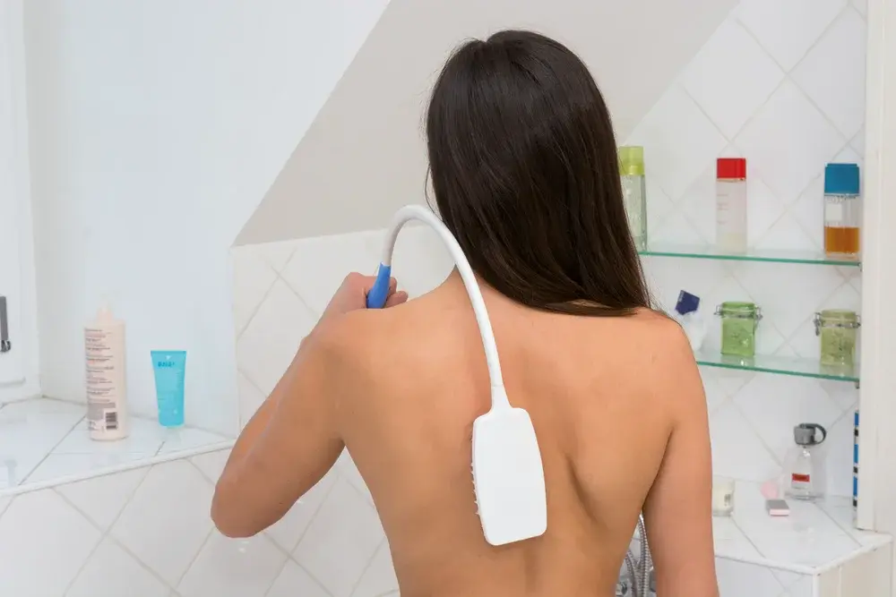 Brosse incurvée pour le dos